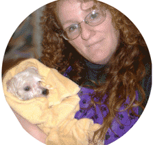 Photo of Kim and groomed dog